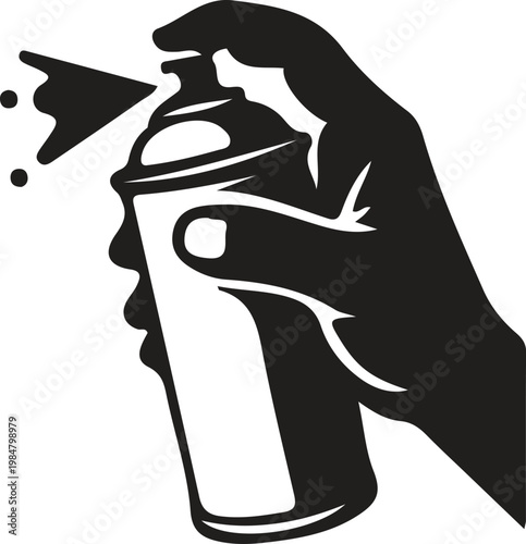 Hand holding a spray paint can spraying paint street art black and white