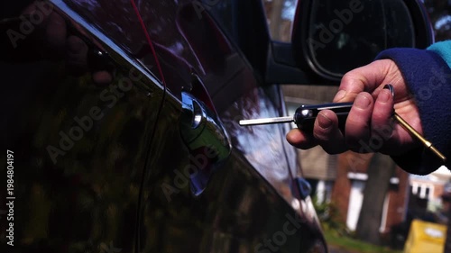 Driver unlocking and opening car door