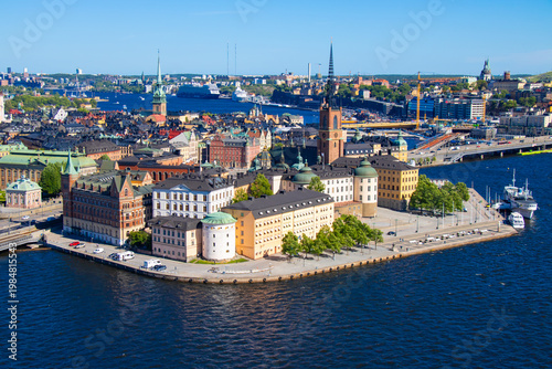 Aerial panoramic view of Gamla Stan old town in Stockholm with waterfront and historic buildings