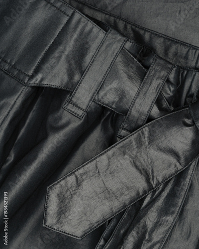 Black Coated Fabric Pants Belt Closeup