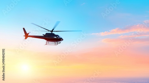 Helicopter Flying Over Scenic Landscape at Sunset with Colorful Sky