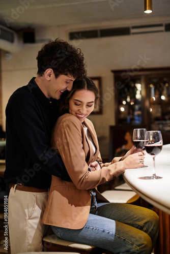 Фотография Celebrating love at a cozy restaurant on their anniversary