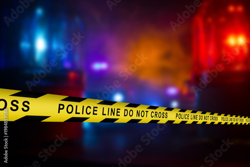 a small set of police yellow ribbons with the text prohibiting passage