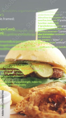 Vertical video: Camera pushing burger into focus as code overlay scrolling, showing pickle for menu