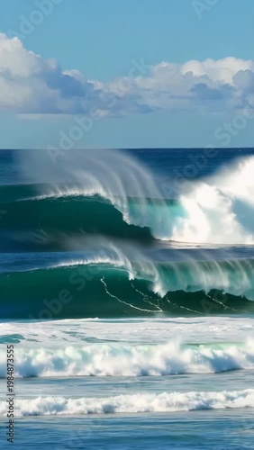 The sea is surging with waves, and the waves are rolling in the natural landscape