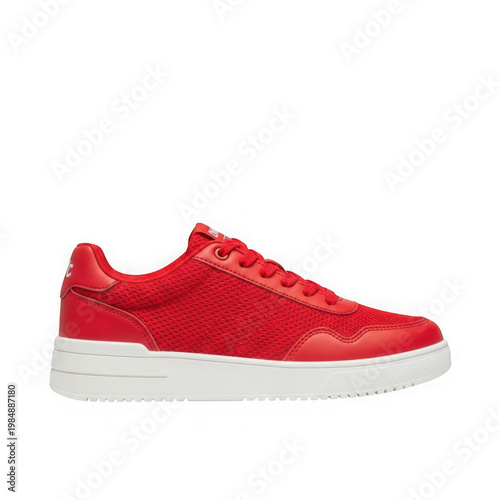 Vibrant red athletic sneaker with white midsole and black laces on black background red sneaker