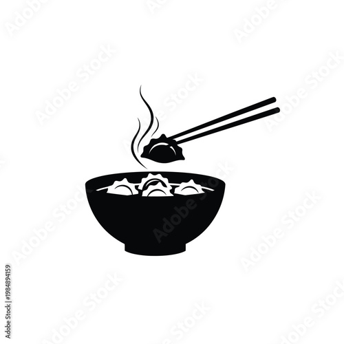 Black silhouette of steaming dumplings in bowl with chopsticks  Asian food