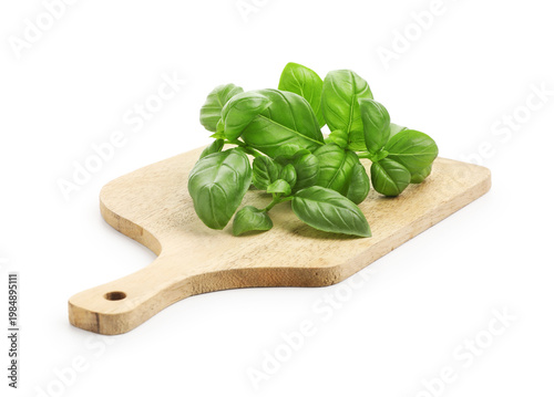 Fresh basil leaves and board isolated on white