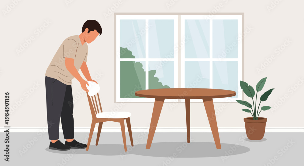 Fototapeta premium Man tidying up a dining room, placing a chair at a wooden table near a window.