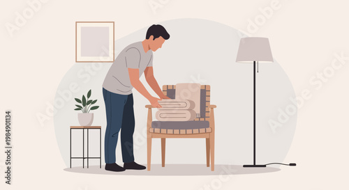 Man tidying up living room, folding blankets on armchair, home organization concept