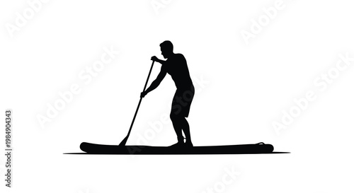 Silhouette of a man paddleboarding on a calm body of water