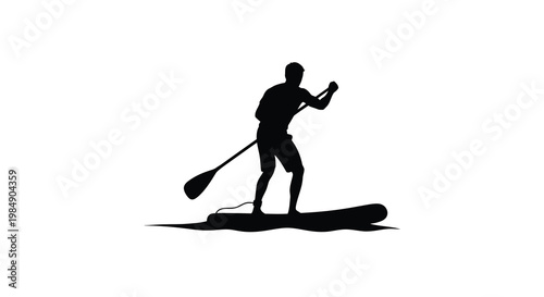 Silhouette of a person paddleboarding on calm water