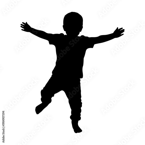 Fotografie A joyful child jumping in the air with arms outstretched in silhouette