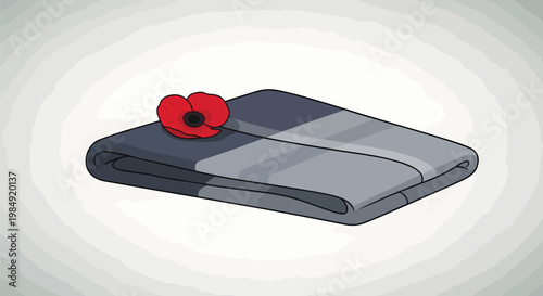 Folded poppy remembrance lapel pin, red flower, black centre, grey background