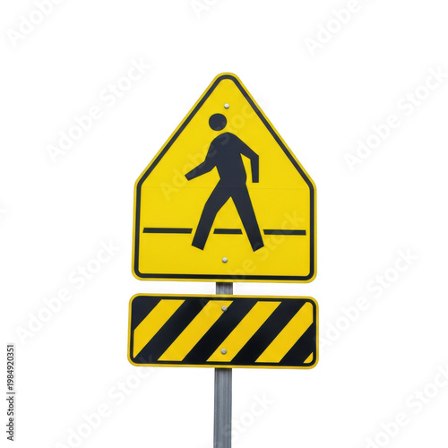 A yellow pedestrian crossing sign with a black silhouette of a person walking on a crosswalk