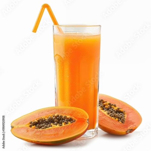 Refreshing papaya juice served in a tall glass with fresh papaya slices beside it for a tropical delight
