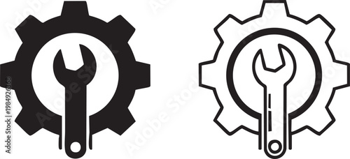 Black and white wrench inside gear wheels tool