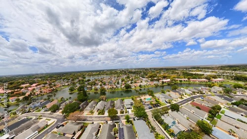 Aerial fpv video of a neighborhood transition to earth view