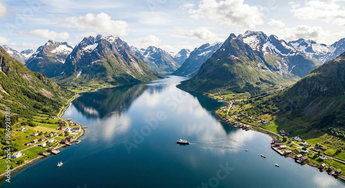 Mountains reflect on clear waters of a serene lake.