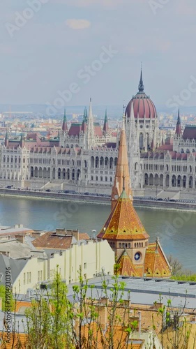 Aerial 4K vertical video footage of Hungarian Parliament and Budapest architecture, stunning historic building from above, European cityscape, iconic landmark 