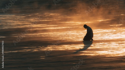 Silhouette of a kneeling person in prayer on a serene sand background illuminated by soft golden sunlight, evoking tranquility and spiritual reflection