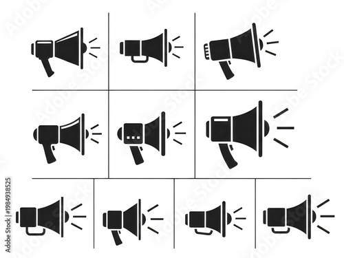 A row of colorful wooden kitchen utensils on a wooden surface