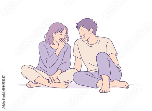 Couple enjoying playful moment in a quiet evening setting, sitting on the floor and sharing light laughter together, minimalist