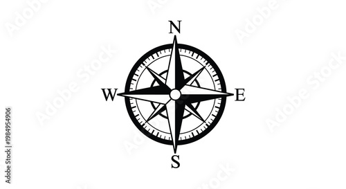 A classic black compass rose displaying cardinal directions a striking silhouette
