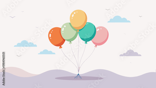 Colorful balloons floating in a light sky with soft hills