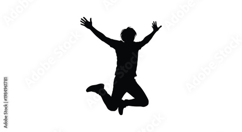 A joyful person leaps into the air with arms raised a striking silhouette