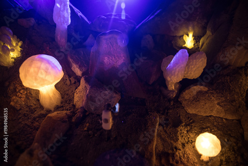 Abstract Miniature of Another Planet with Giant Glowing Mushrooms. A Nighttime Scene on an Alien World, Illuminated by the Soft Glow of Otherworldly Fungi.