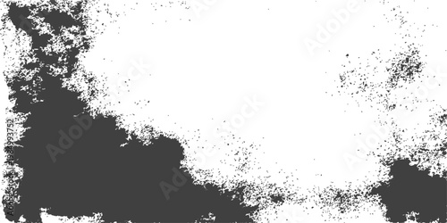 Abstract grunge background with dark ink splashes and a vintage paint splatter texture featuring a black spray design and an old paper border illustration