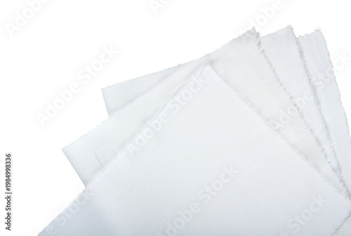 Several torn white cotton fabric pieces with frayed edges isolated on transparent background, top view