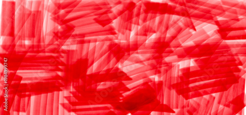 Abstract red marker strokes with dense overlapping scribble texture, creating a chaotic hand drawn background