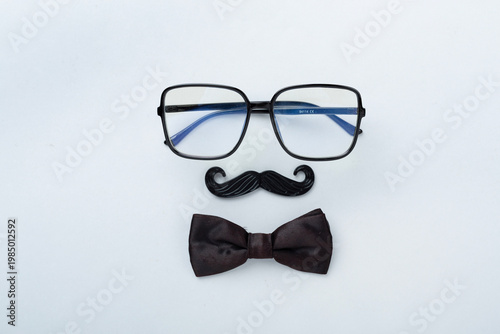 Happy Father's Day accessories on color background, top view