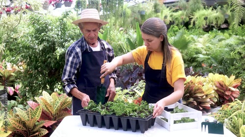 Happy military father and sons including child with disability having fun hugging at home - Family love and support concept