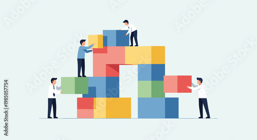 Business people stacking colorful blocks high.