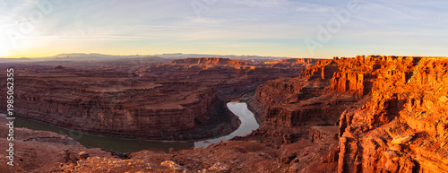 This stunning sunrise panorama features the Colorado River deep within Canyonlands National Park near Moab, Utah.