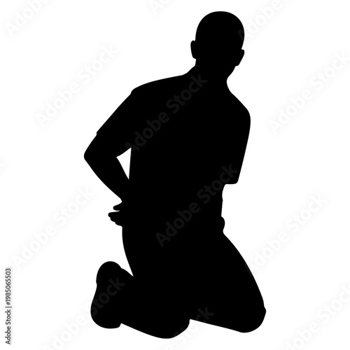 Silhouette of a man kneeling with hands behind his back.