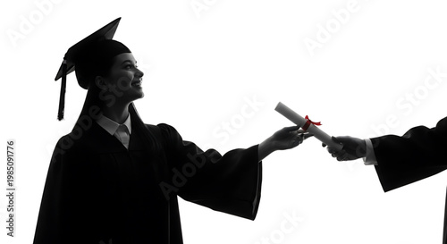 A graduate in silhouette receiving a diploma from an unseen person