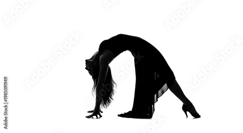 A silhouette of a woman in a backbend pose on a white background