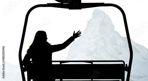 A silhouette of a woman riding a ski lift with a mountain in the background