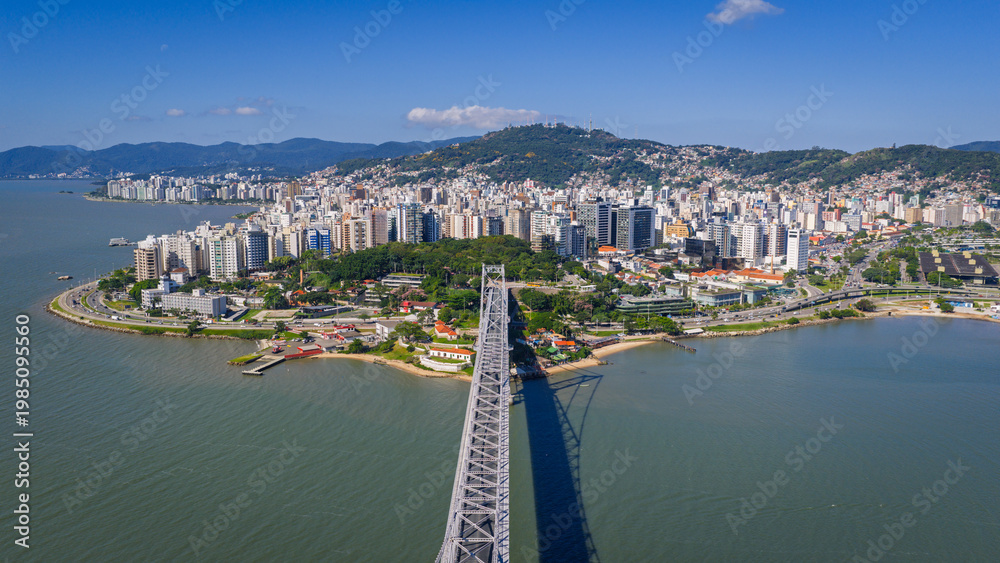 Obraz premium Aerial view of Hercilio Luz Bridge leading to Florianopolis skyline in Santa Catarina Brazil. 