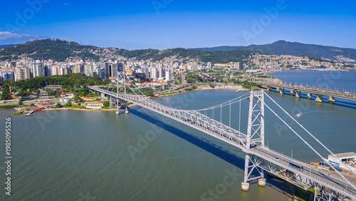 Konstfotografi Hercílio Luz Bridge in Florianopolis Brazil spanning blue bay waters under clear sky