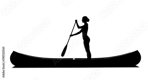 A black silhouette of a woman standing in a canoe and paddling on calm water