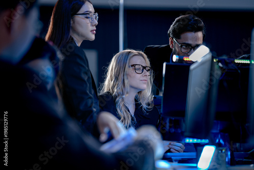Fotografie Building tomorrow AI tonight deep focus diverse engineers code train complex models multi screen setup innovation lab intense collaboration future tech taking shape now project crunch