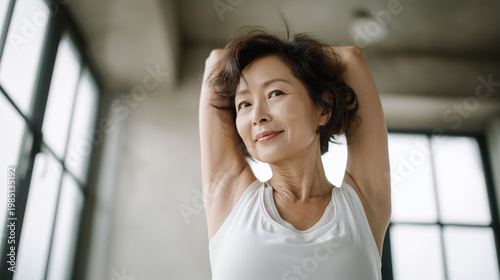 Portrait of a Healthy Middle-Aged Lady Working Out in White Sportswear, Copy Space