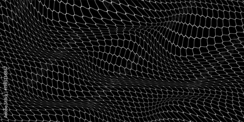 soccer ball moving in to goal net isolated on black background