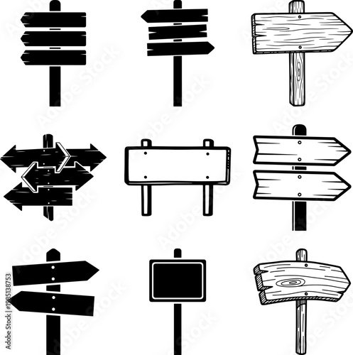 Collection of various wooden and blank directional signs on white