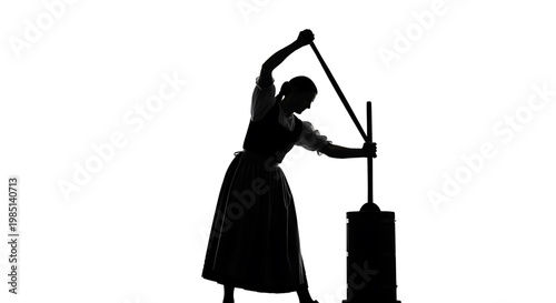 A black silhouette of a woman working with a vintage manual press